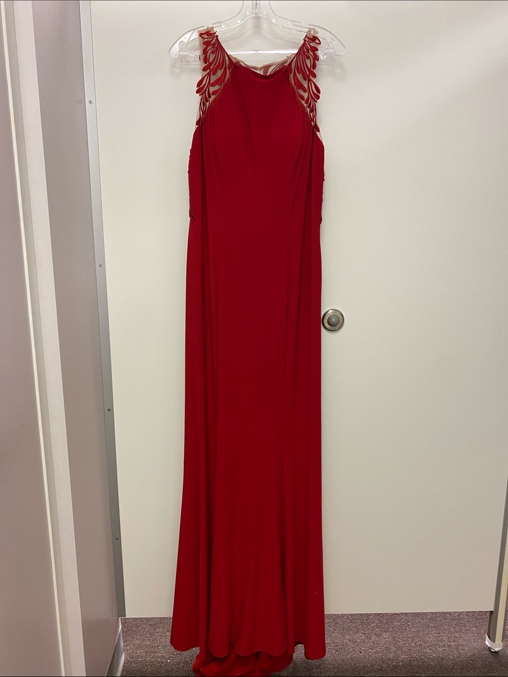 Elegant Red Evening Gown with Decorative Shoulder Detail